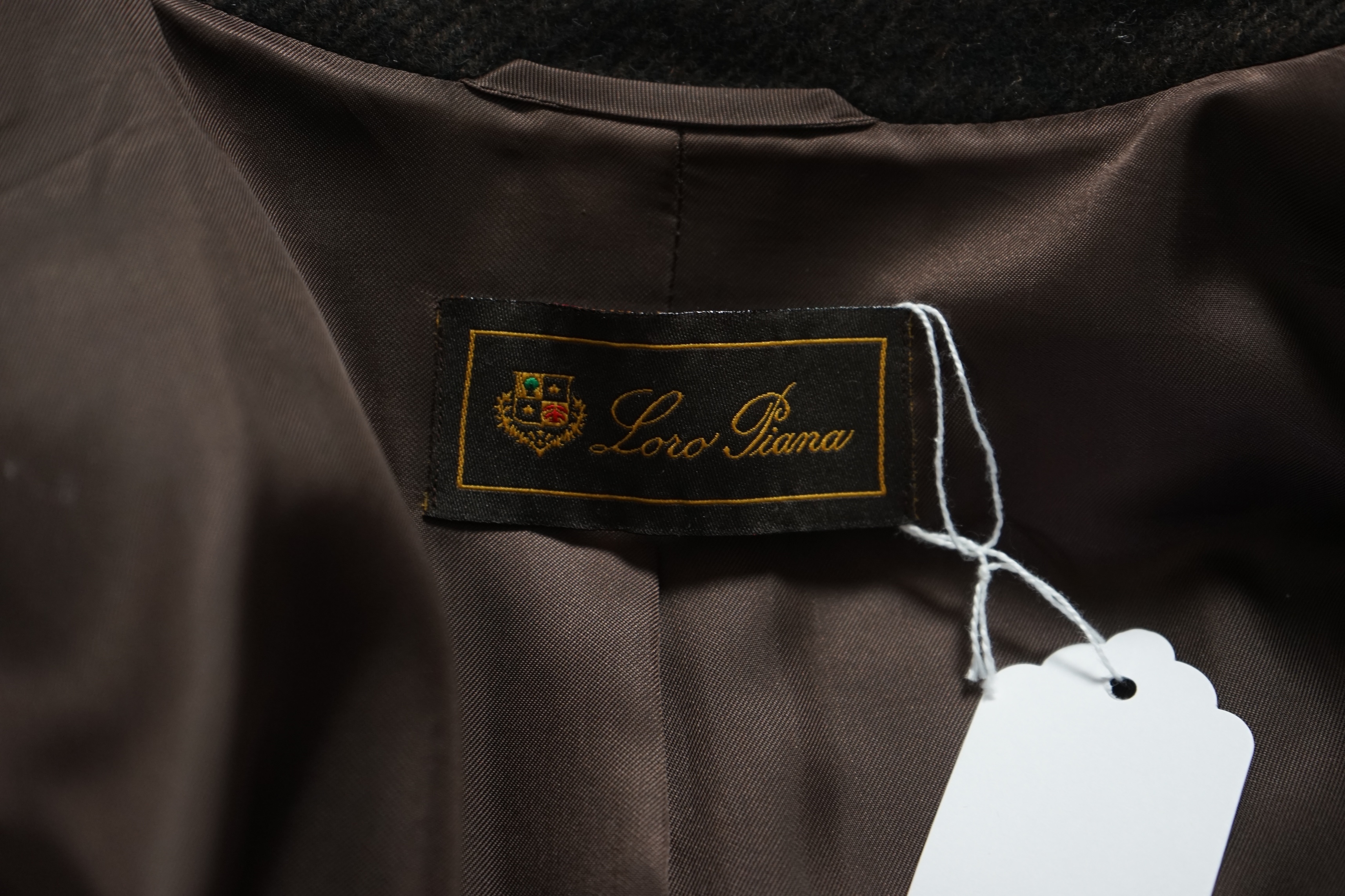 A lady's brown Loro Piana cashmere long coat and a grey cashmere knitted jacket. Approx Sizes 14 Proceeds to Happy Paws Puppy Rescue